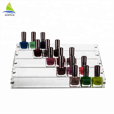 As prateleiras de exposição estratificados acrílicas do tampo da mesa guardam a cremalheira de exposição acrílica do verniz para as unhas