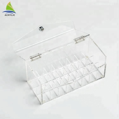 A vitrina acrílica transparente do batom da composição compõe o organizador